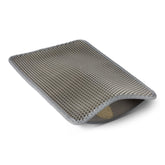 Alfombrilla para gatos Amazon Basics de doble capa atrapa arena y mantiene el piso limpio