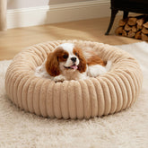 Bedsure ComfyFleece: cama redonda para perros en color arena, proporcionando confort suave.