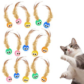 Bouncy Tails: bola-gato-plumas-naturales, estimula juego activo en interiores.