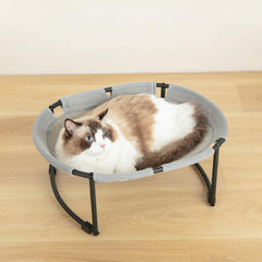 CatAve hamaca para gato con forma oval y diseño cómodo para estirarse.