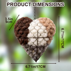 Corazón-nido-materiales-naturales: dos bolsas de fibras para nidos.