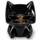Tazón elevado DNOYEUS para gato con alimentación lenta, ideal para comidas tranquilas.