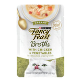 Fancy Feast caldo cremoso de pollo y vegetales en bolsa, para realzar sabor y humedad.
