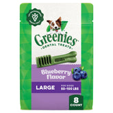 Golosina dental Greenies para perros grandes con sabor arándano y textura masticable.