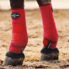 Botas Harrison Howard delanteras con absorción de choque para protección durante entrenamiento.