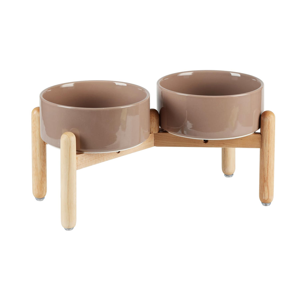 Havniva cerámica con tazones elevados y soporte de madera para perros.