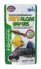 Hikari Mini Algae Wafers en empaque visible; alimento balanceado para peces pequeños.