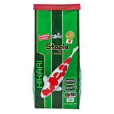 Hikari pellets flotantes para koi, control de porciones y alimentación diaria.