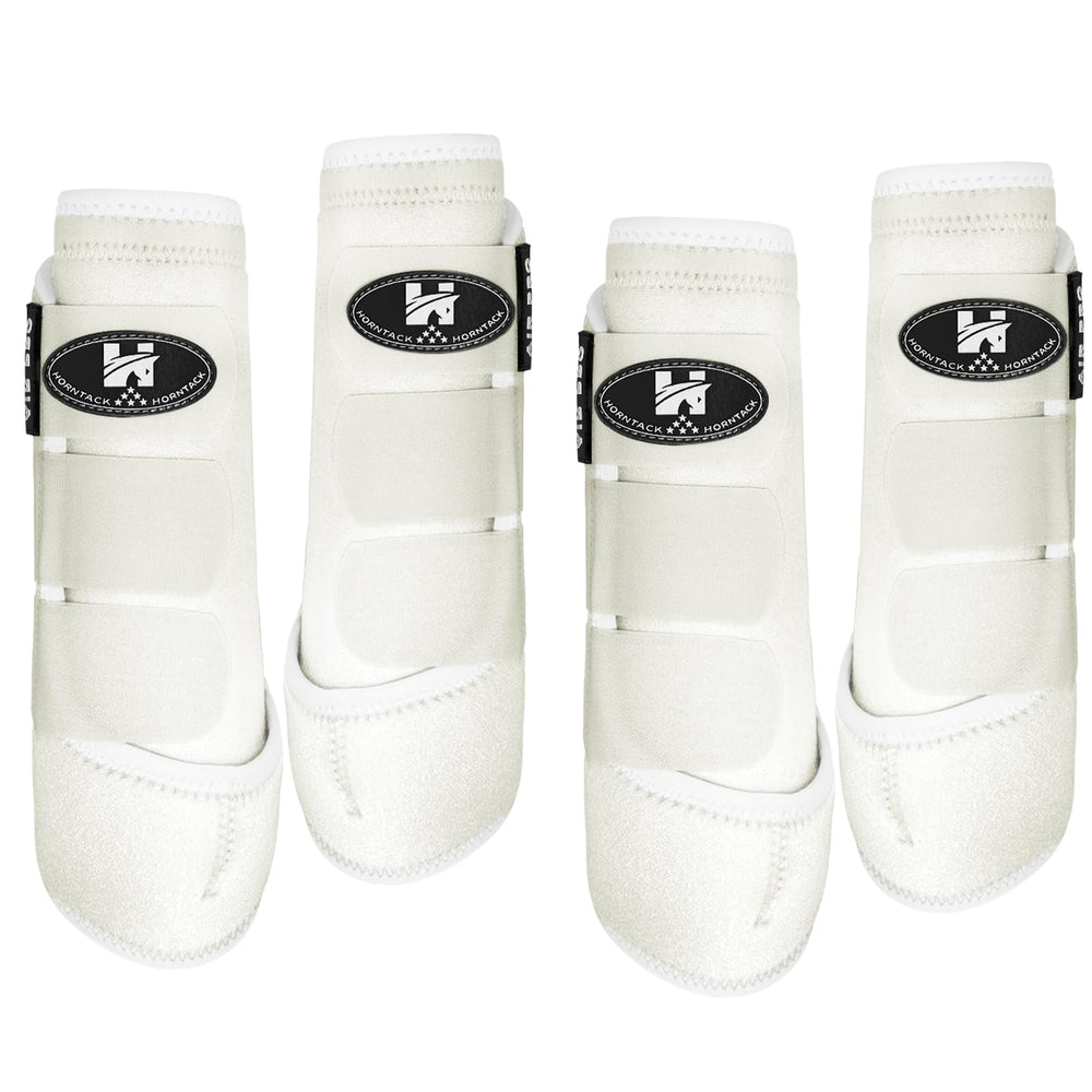 Botas Horntack para espinillas en caballo blanco grande, protección de tendones y ajuste frontal.