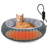 La INVENHO cama donut calefactable para gatos en interiores ofrece confort cálido para dormir