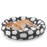 La cama-dona JOEJOY para perro mediano ofrece soporte cómodo para siestas.