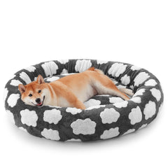 La cama-dona JOEJOY para perro mediano ofrece soporte cómodo para siestas.