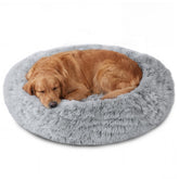 Cama donut JOLLYVOGUE para perros grandes, gris humo, reposo suave y seguro.