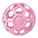 JW Hol-ee Roller, pelota puzzle rosa para perros, estimula resolución de problemas durante el juego.