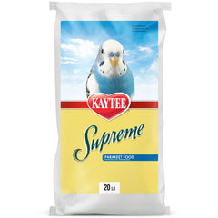 Kaytee Supreme para periquitos, frasco muestra mezcla natural para enriquecimiento y frescura.