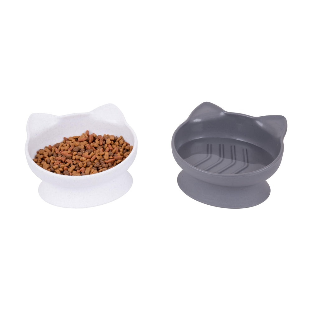 Kitty City: tazones alimentación lenta elevados (blanco y gris), fomentan ingesta más calmada.