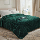 LOOBANI manta impermeable para cama con hojas jacquard, protege la superficie de derrames.