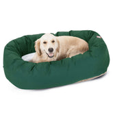 Cama bagel Majestic Pet verde con sherpa central para descanso cómodo