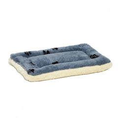 MidWest QuietTime XXS, cama para jaula, vista superior azul con huellas, ideal para transporte.