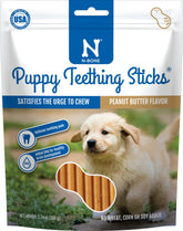 N-Bone Puppy Palitos de dentición con mantequilla de maní dentro de una bolsa, sabor agradable.
