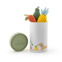 Juguete Nina Woof de verduras en algodón orgánico para estimulación mental