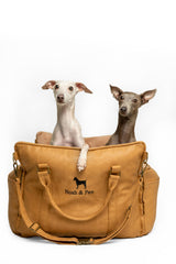 NOAH & PAW asiento para perro pequeño con arnés integrado para viajes seguros.
