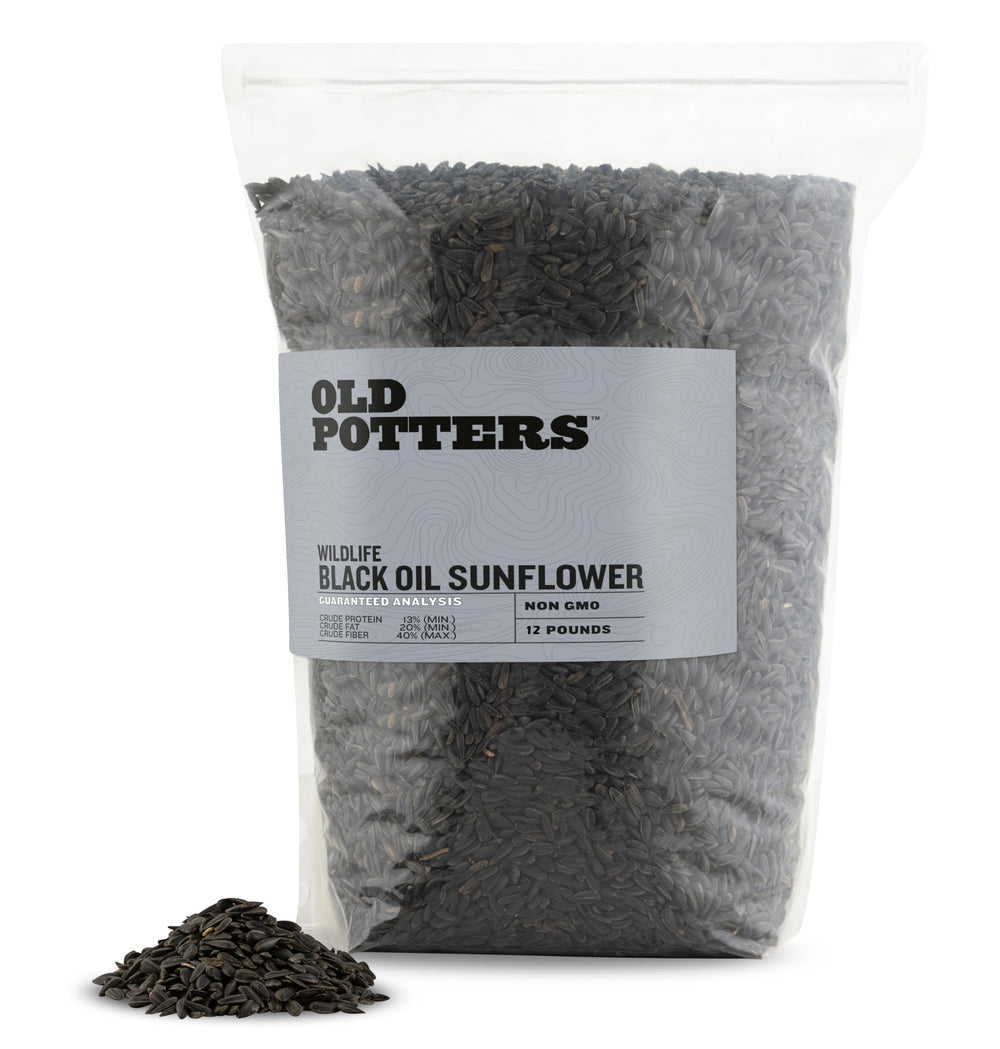 Old Potters semillas de girasol negro para aves, ideales para atraer aves en exteriores.