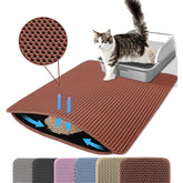Petinstinct alfombrilla XXL con capa superior de panal atrapa arena junto a la caja