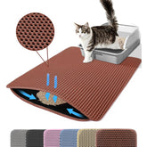Almohadilla Petinstinct XL para caja de arena para gatos frente a la caja, atrapa partículas.