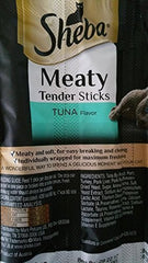 Gato disfruta recompensa con Sheba Meaty Tender Sticks sabor atún