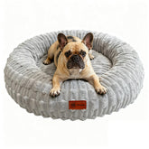 Cama ShinHye para perros pequeños, diseño redondo gris, descanso suave.