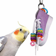 Beaker Sneaker con cuentas vibrantes para estimular exploración y juego.
