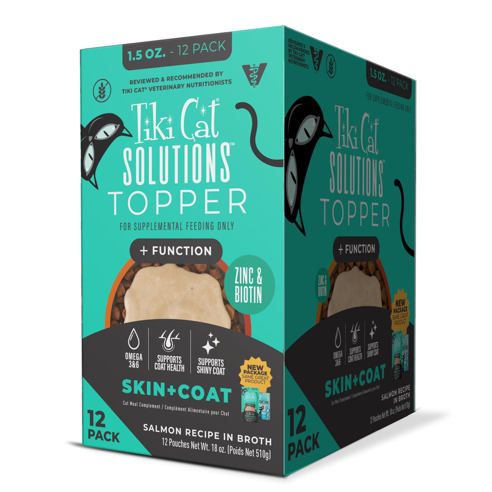 Tiki Cat Solutions Topper para piel y pelaje con salmón en caldo, aspecto saludable.