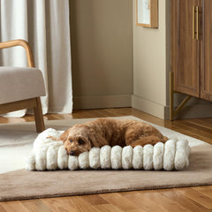 Town & Country Luxe CuddleTown almohada adicional para soporte del cuello.