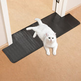 Protector Uross para alfombra de puerta negro, evita arañazos de gatos.