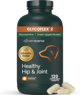 VetriScience Healthy Hip & Joint: tabletas para perros en envase, soporte diario de articulaciones.