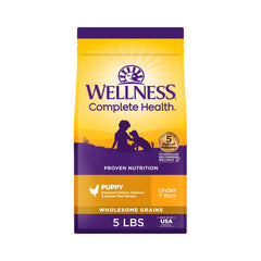 Wellness alimento seco para cachorros, empaque visible para conservar frescura.
