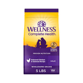 Wellness Complete Health, alimento seco para perros con pollo y avena, favorece salud general.