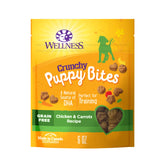 Wellness Puppy Treats crujiente, pollo y zanahoria para cachorros, ideal para entrenamiento.