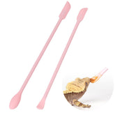 WOLEDOE dos cucharas para mezclar fruta reptil rosa, facilita la alimentación variada.