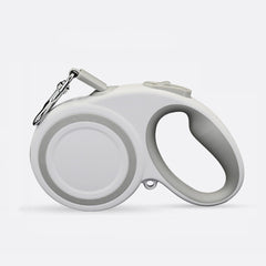 XCXQ correa retráctil 360° para perros con alcance de 16 ft para paseos seguros.