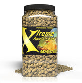 Xtreme Monster Pellets 9mm, hundimiento lento, ideal para peces grandes como Oscars, promoviendo nutrición estable.