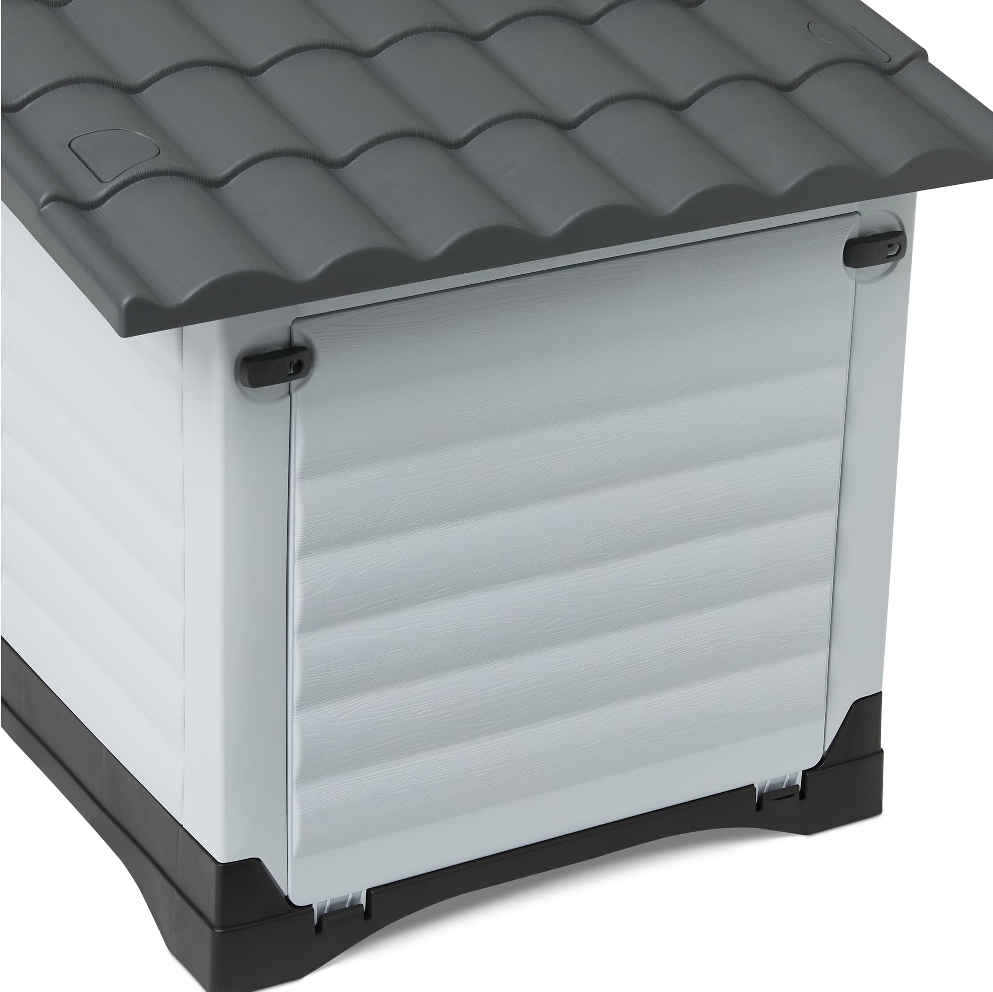 Piso elevado de la caseta Amazon Basics mantiene seco al perro y facilita la limpieza.