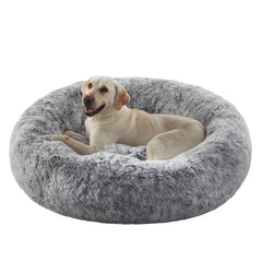 BedStill cama donut para perros XL en gris, descanso envolvente.
