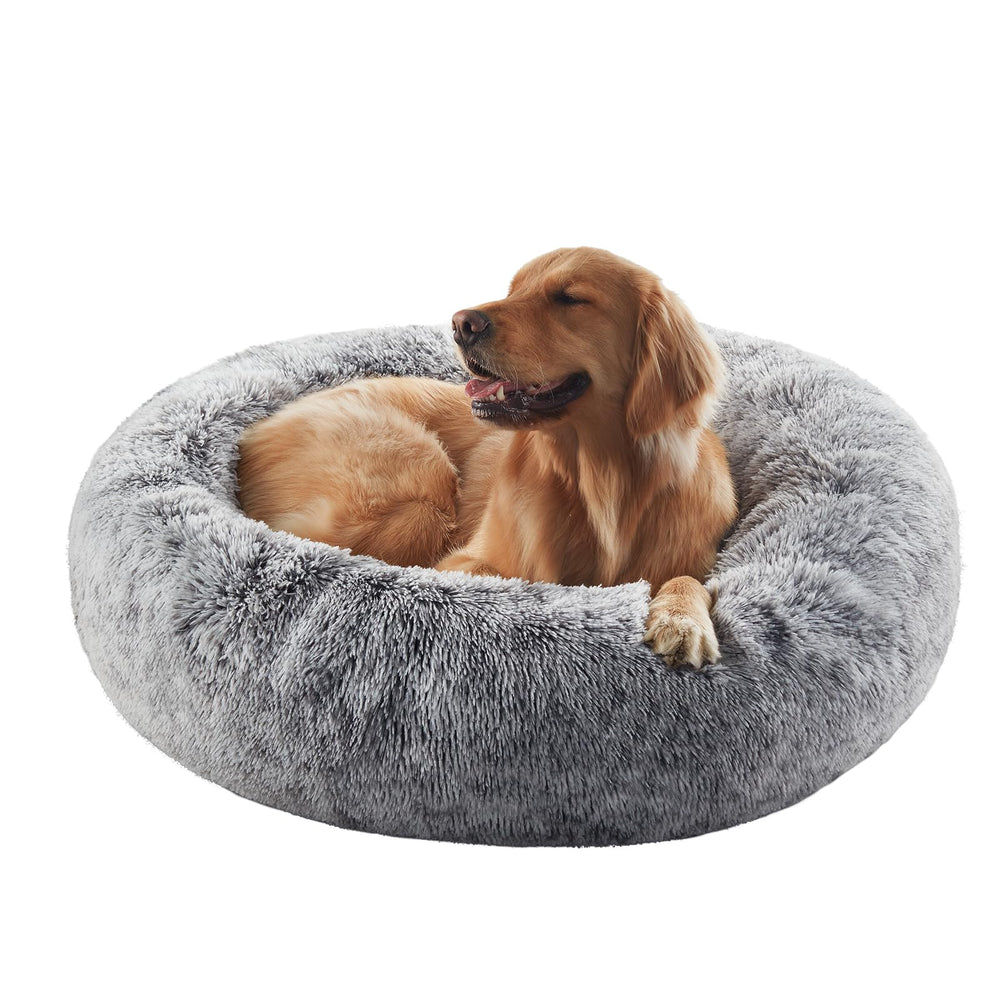 BedStill cama donut para perros grandes en gris ofrece descanso cómodo y seguro.