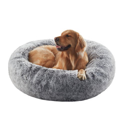 BedStill cama donut para perros grandes en gris ofrece descanso cómodo y seguro.