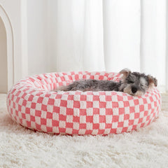 Cama donut BFPETHOME para perro pequeño en rosa, descanso suave y seguro.