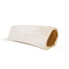 Cadet hueso relleno con mantequilla de cacahuete, ideal para masticación prolongada
