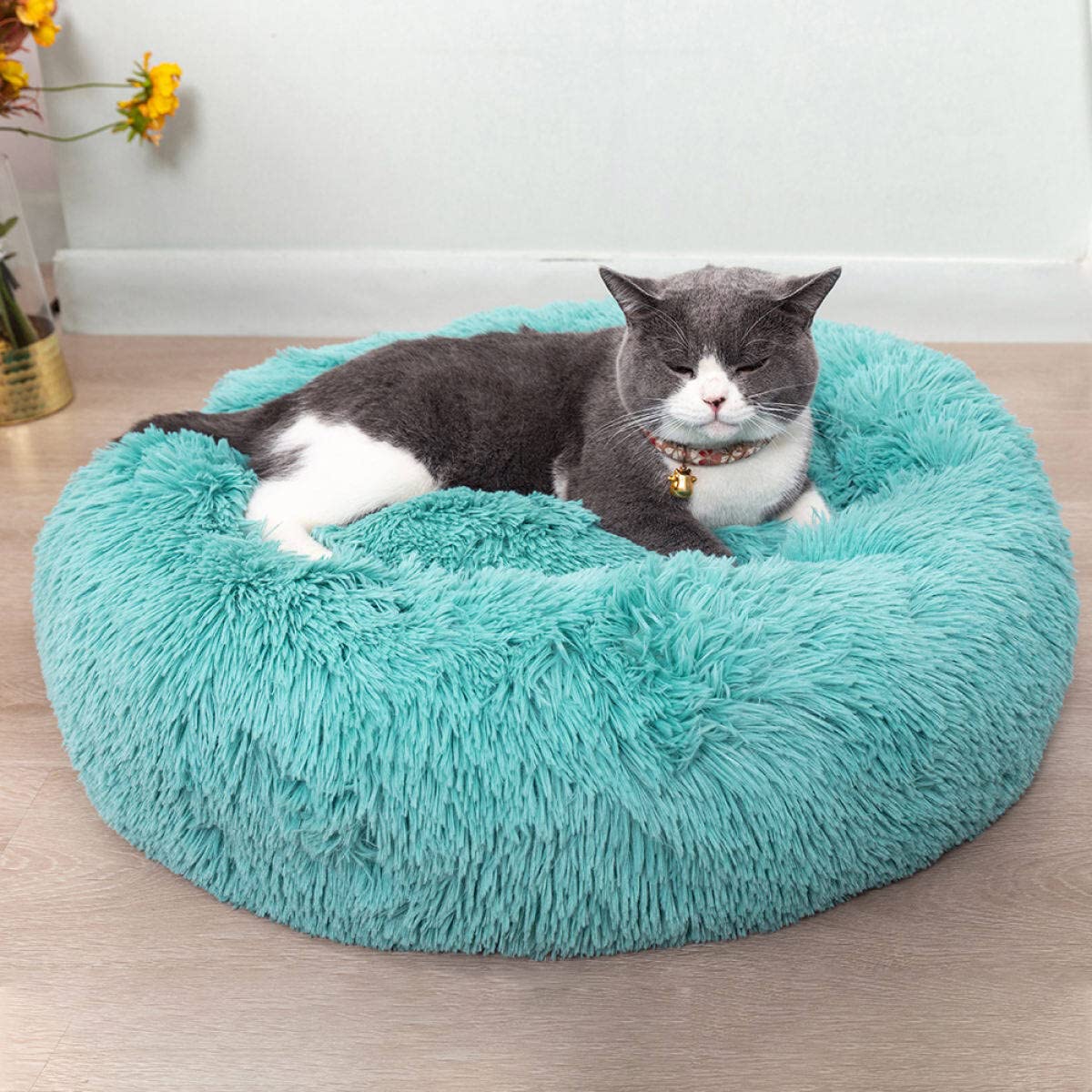 Cama-donut-peluche interior azul 20x20 suave y cálida para gatos.