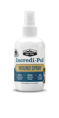 Dr. Pol Incredi-Pol Wound Spray, aplicación en la pata de perro, facilita el tratamiento de heridas
